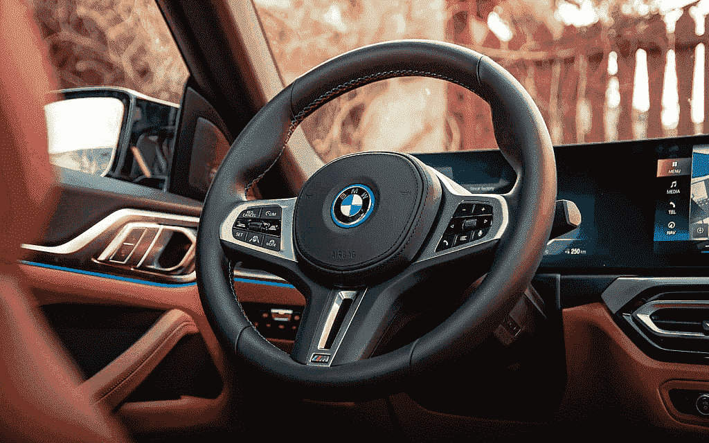 What is the purpose of the stiffness in BMW steering wheels? 